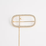 Symphony signature brooch